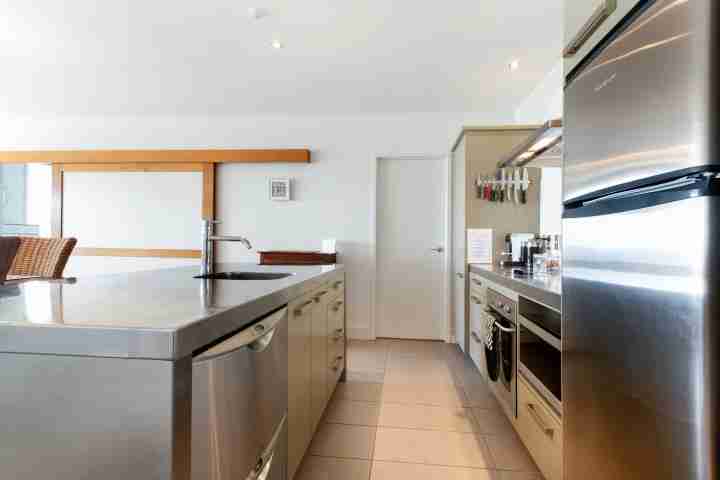 Modern well-equipped kitchen at apartment on the beach Onetangi