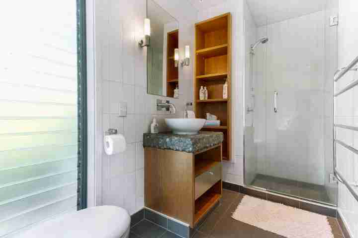 Ensuite bathroom in modern beachfront apartment, Waiheke Island