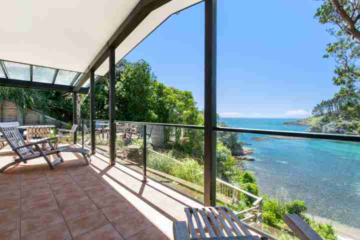 Escape to beachfront family home with expansive sea views this summer