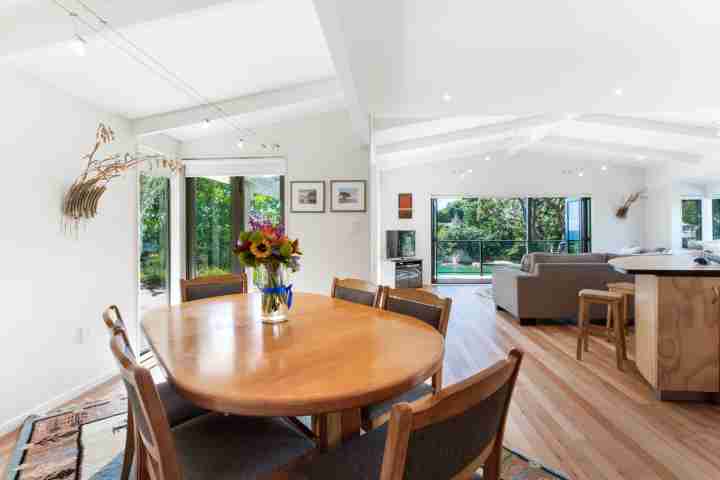 Experience open-plan dining at sunny family home, Beachfront Enclosure Bay