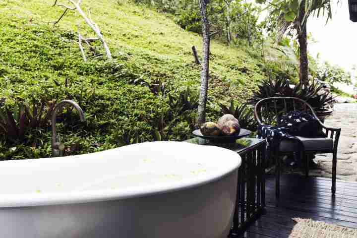 Bedarra Island Private Outdoor Bath shrouded in Greenery