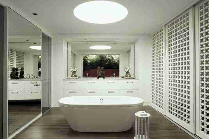Large bathtub in South Asian style Bathroom at luxury Byron Bay Villa