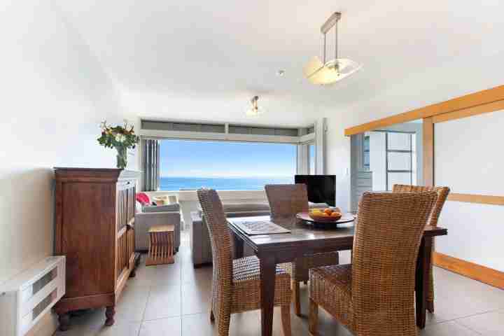 Lounge and dining area with Onetangi Sea View at the Sands
