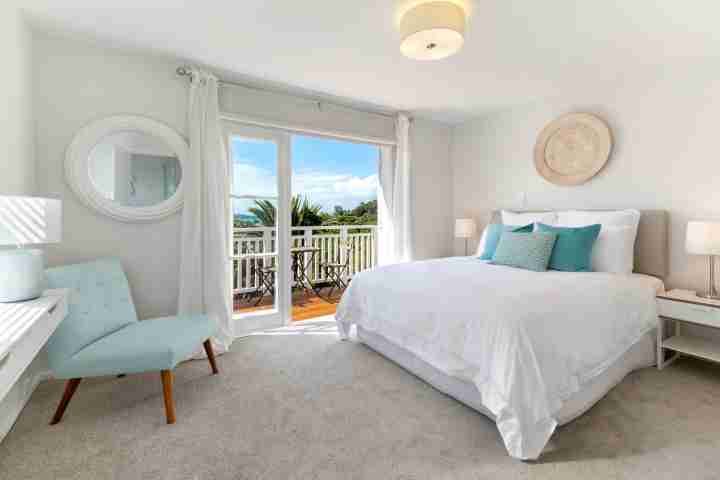 Stay in sunny, spacious master bedroom at Eight on Church on your next Waiheke Escape