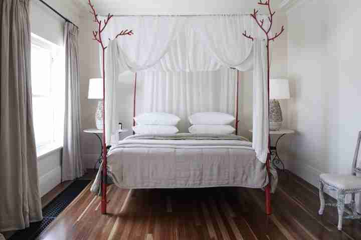 Gaelforce Bedroom and Mosquito Veil, Gaelforce Accommodation Open Plan Kitchen and TV, Luxury Holiday Accommodation NSW Australia