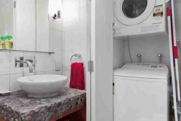 Fully-equipped laundry facilities at Beachfront Apartment, Onetangi