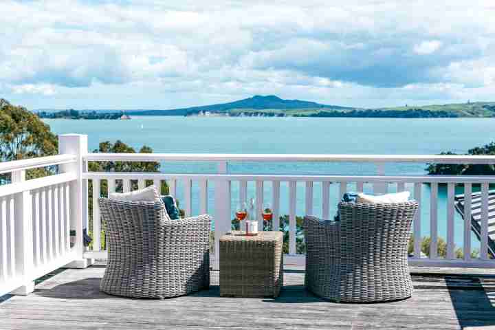Guests stay in luxury with Rangitoto view from private balcony