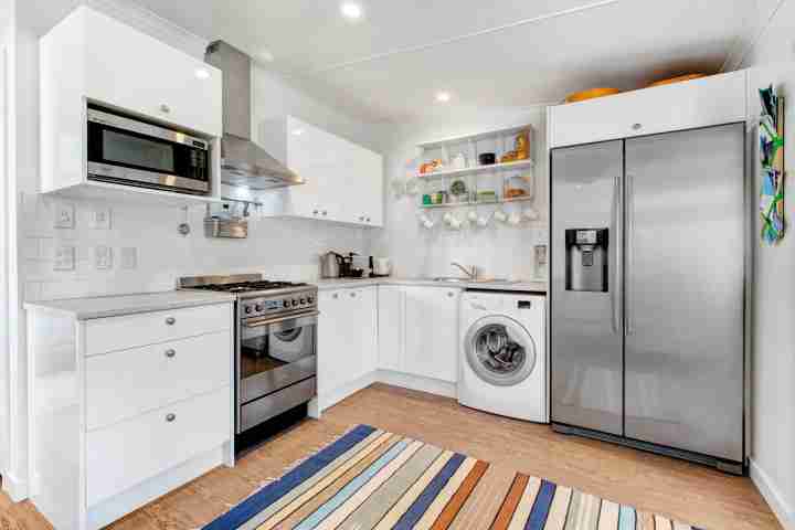 Clean modern kitchen in beautiful kiwi bach