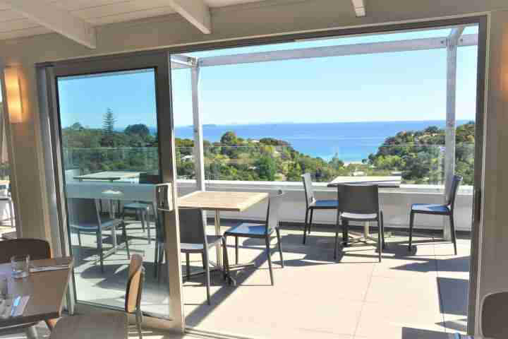 Wine and dine with expansive beach view on your holiday escape to Waiheke Island Resort