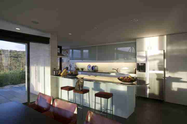 Fully-equipped modern kitchen in self-catered iconic Seidler House, private contemporary luxury holiday accommodation in Australia Southern Highlands