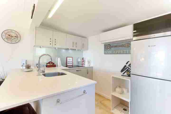 Well-equipped kitchen in self-catered apartment at Waiheke Island Resort