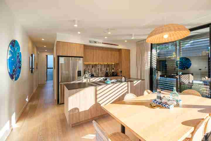 Waiata Beach House Kitchen and Dining Area v2