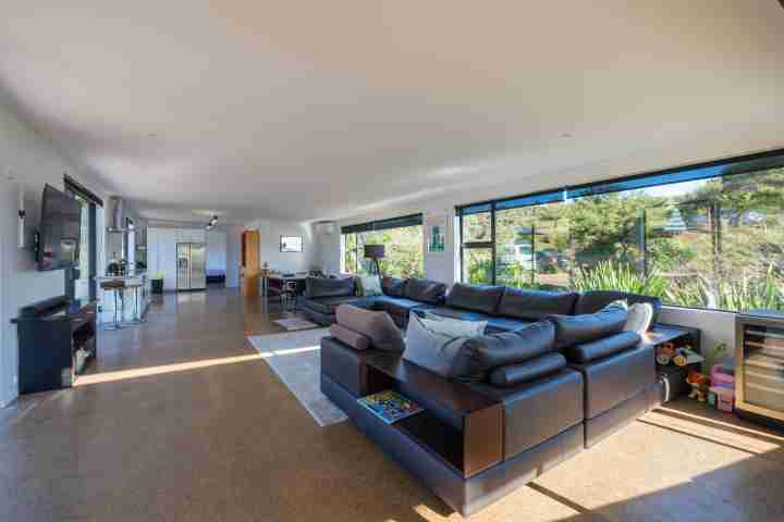 Wharetana Bay Villa Living area with TV