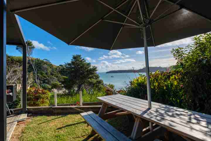 Wharetana Bay Villa Outdoor Dining Area with Bay Views