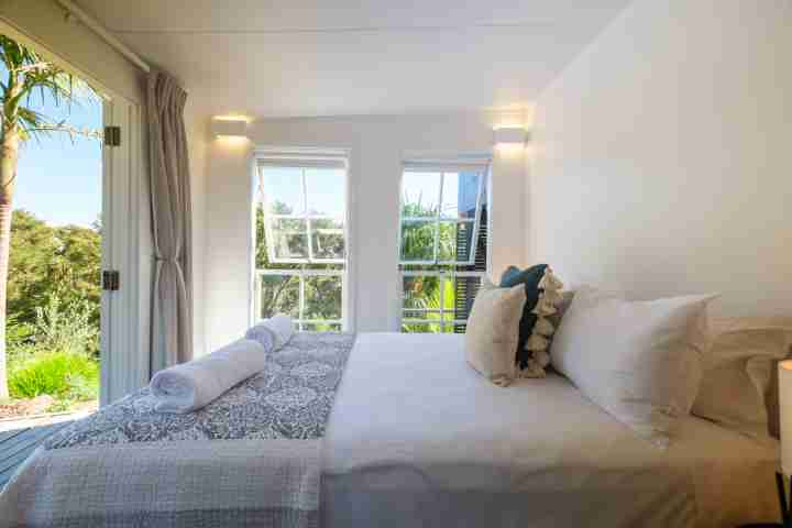 Gulf Island Views Bedroom 1 with french doors to deck