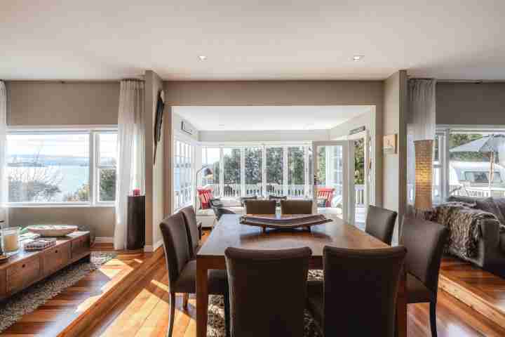 Open plan living and dining The Boat House at Arran Bay
